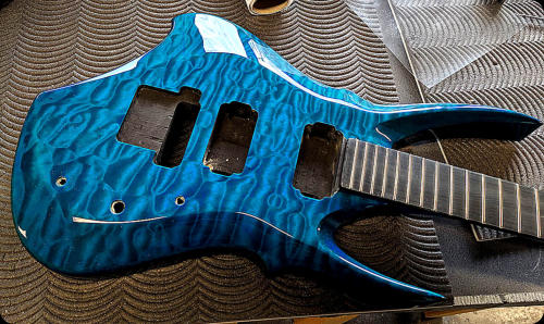 Zerberus Dragon custom electric guitar quilted maple top close up detail