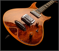 Zerberus Morpheus custom electric guitar Orange Burst stone top angled body view