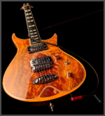 Zerberus Morpheus custom electric guitar Orange Burst stone top angled guitar view